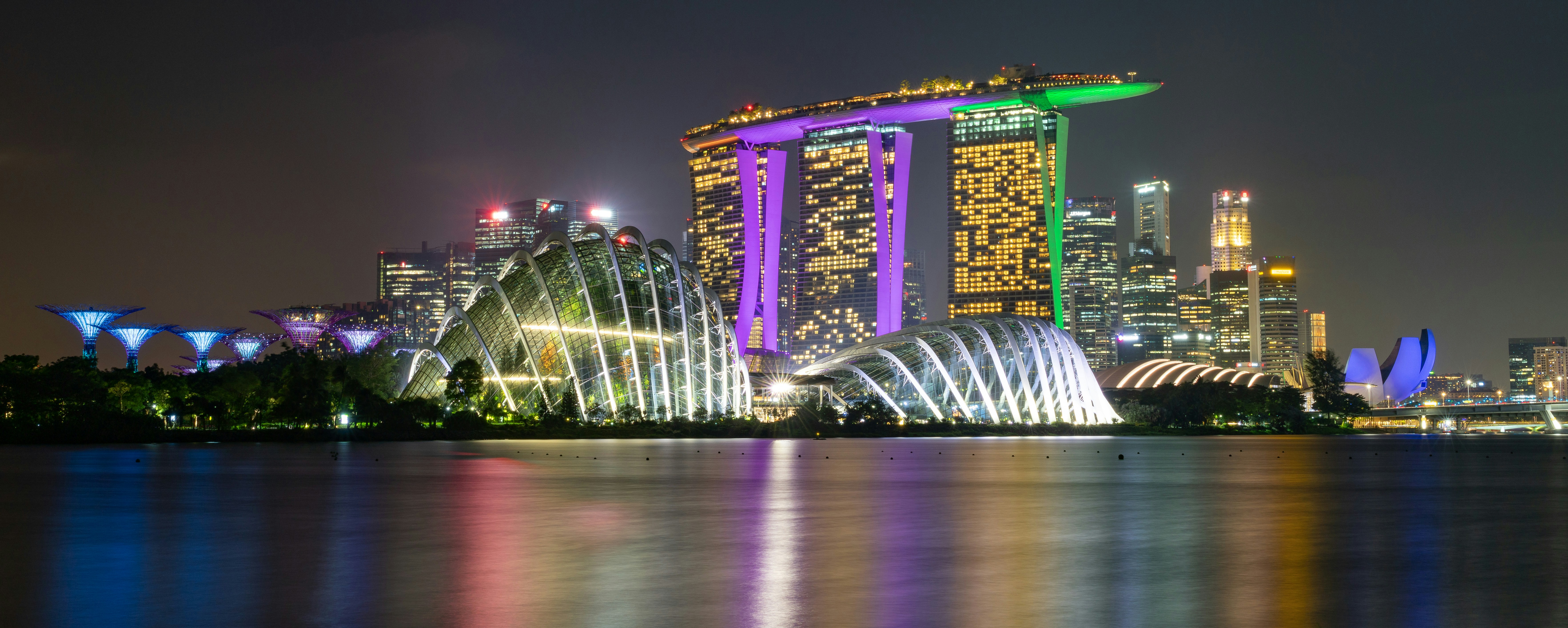 a view of a city at night from across the water
